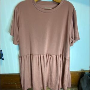 Short sleeve, orange, peplum top.